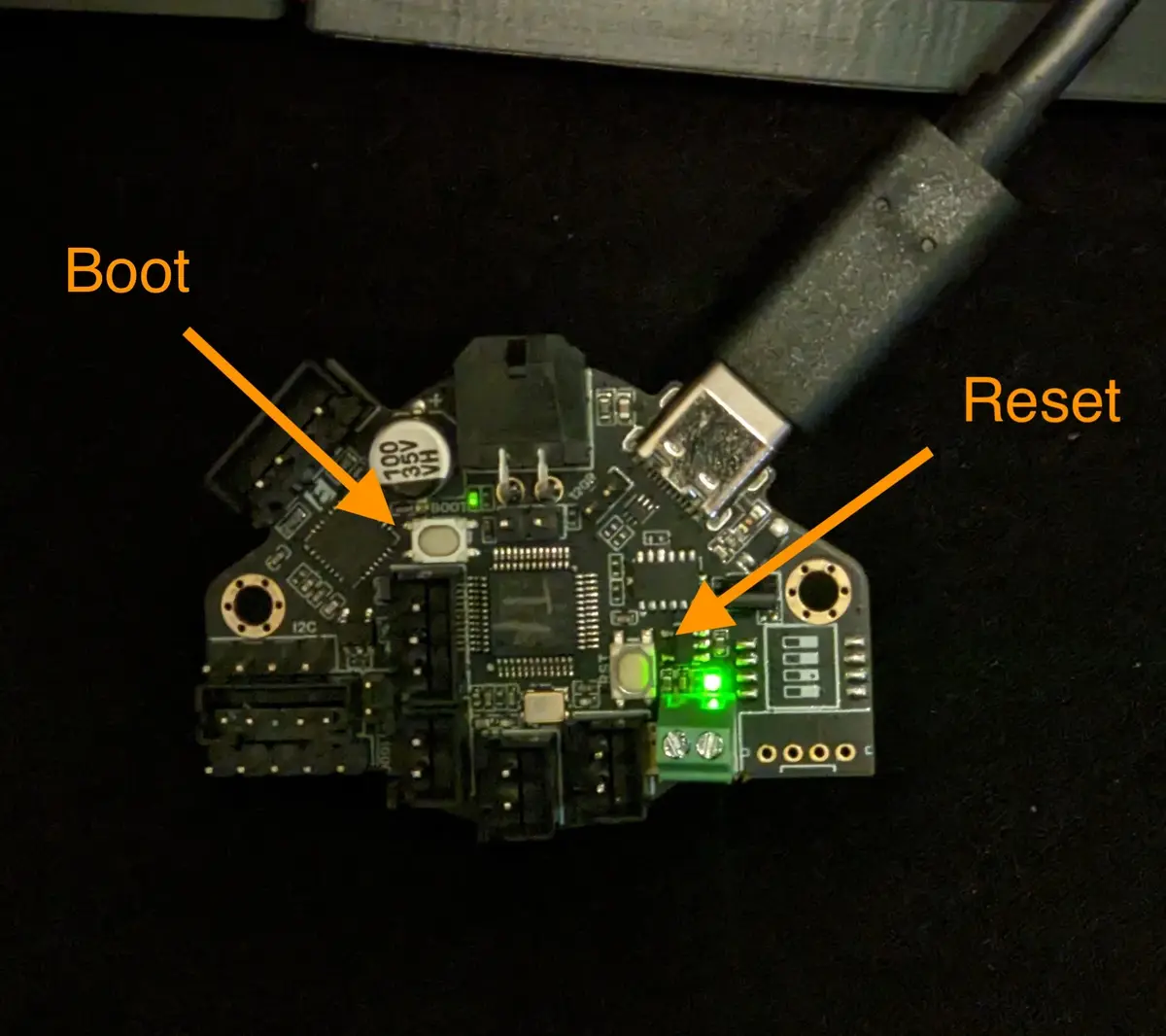 Pressing the boot and reset buttons on the EBB36 with a non-conductive stick